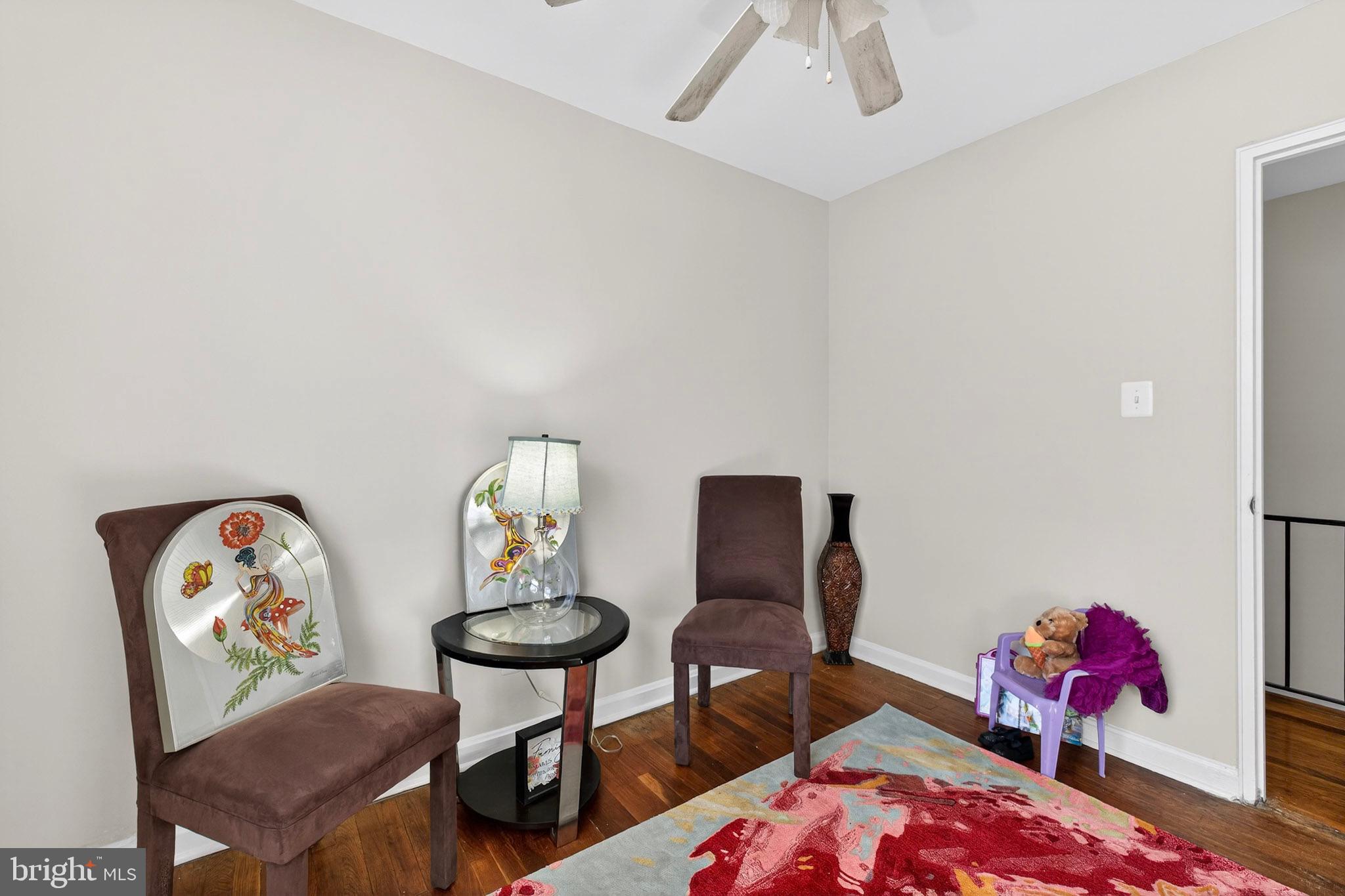 1112 Hamilton Street Northeast Washington, DC 20011 - Photo 23 of 34 a living room with furniture and a table