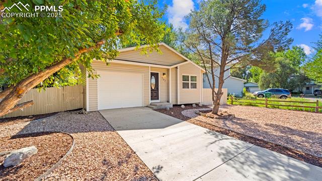 562 Blossom Field Road Fountain, CO 80817 - Photo 3 of 41 Brand new concrete driveway and 1 car attached garage