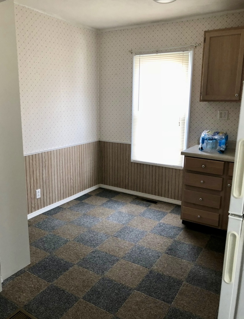 2021 7th Street Peru, IL 61354 - Photo 14 of 18 a view of an empty room and window