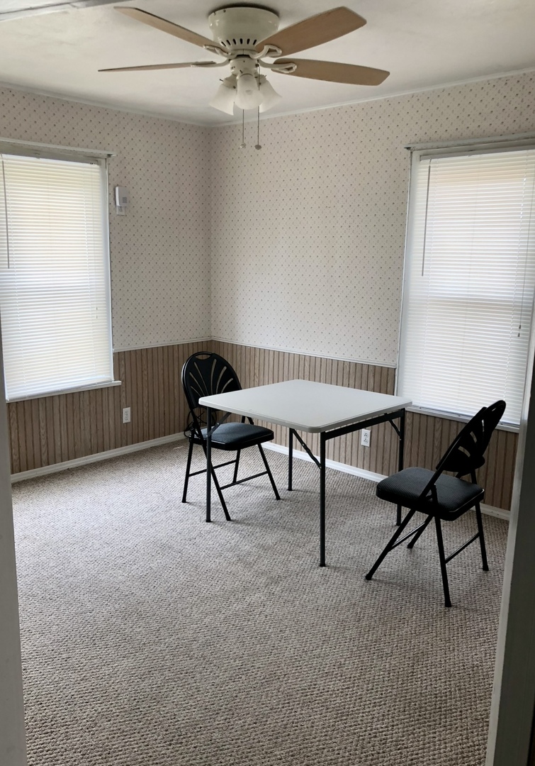 2021 7th Street Peru, IL 61354 - Photo 15 of 18 a room with furniture and a window
