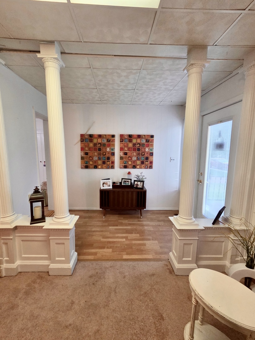 2021 7th Street Peru, IL 61354 - Photo 2 of 18 a living room with furniture and a flat screen tv