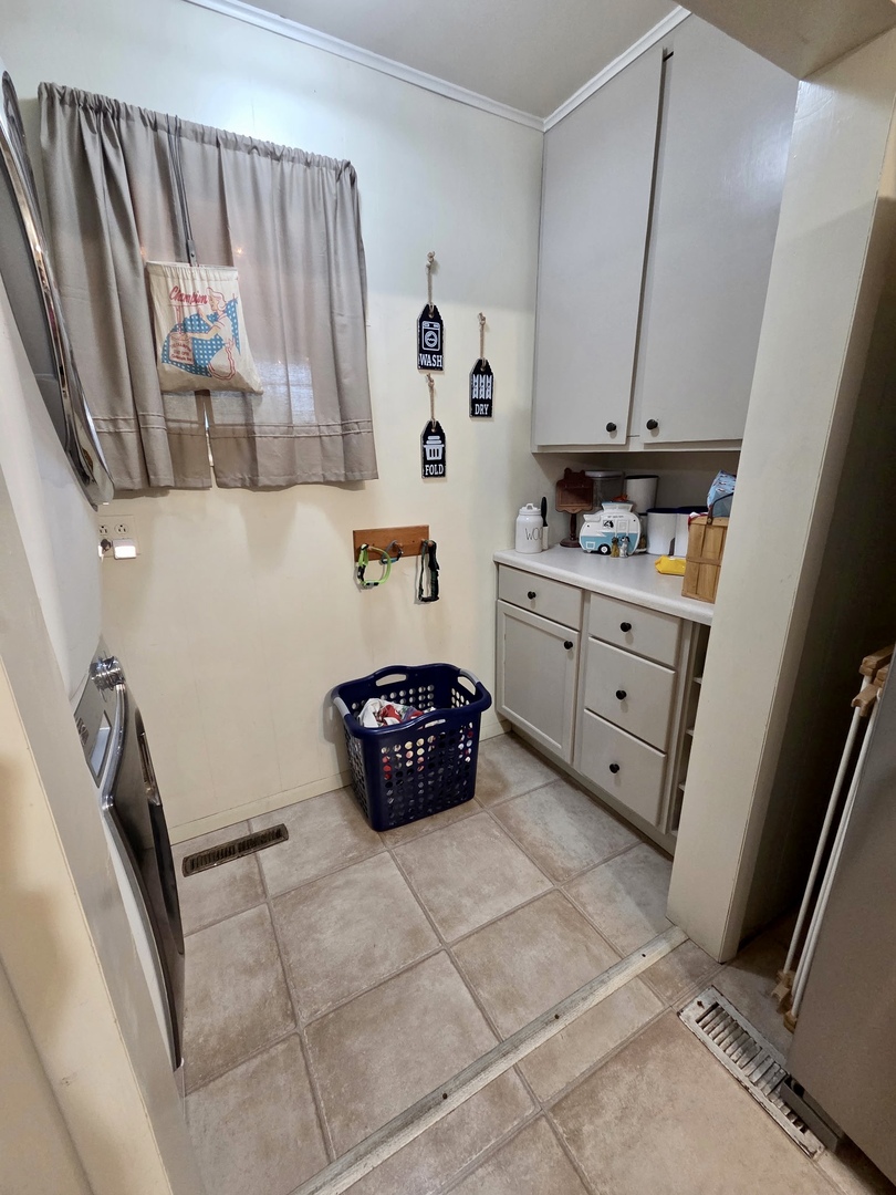 2021 7th Street Peru, IL 61354 - Photo 8 of 18 a kitchen with stainless steel appliances a refrigerator and a sink