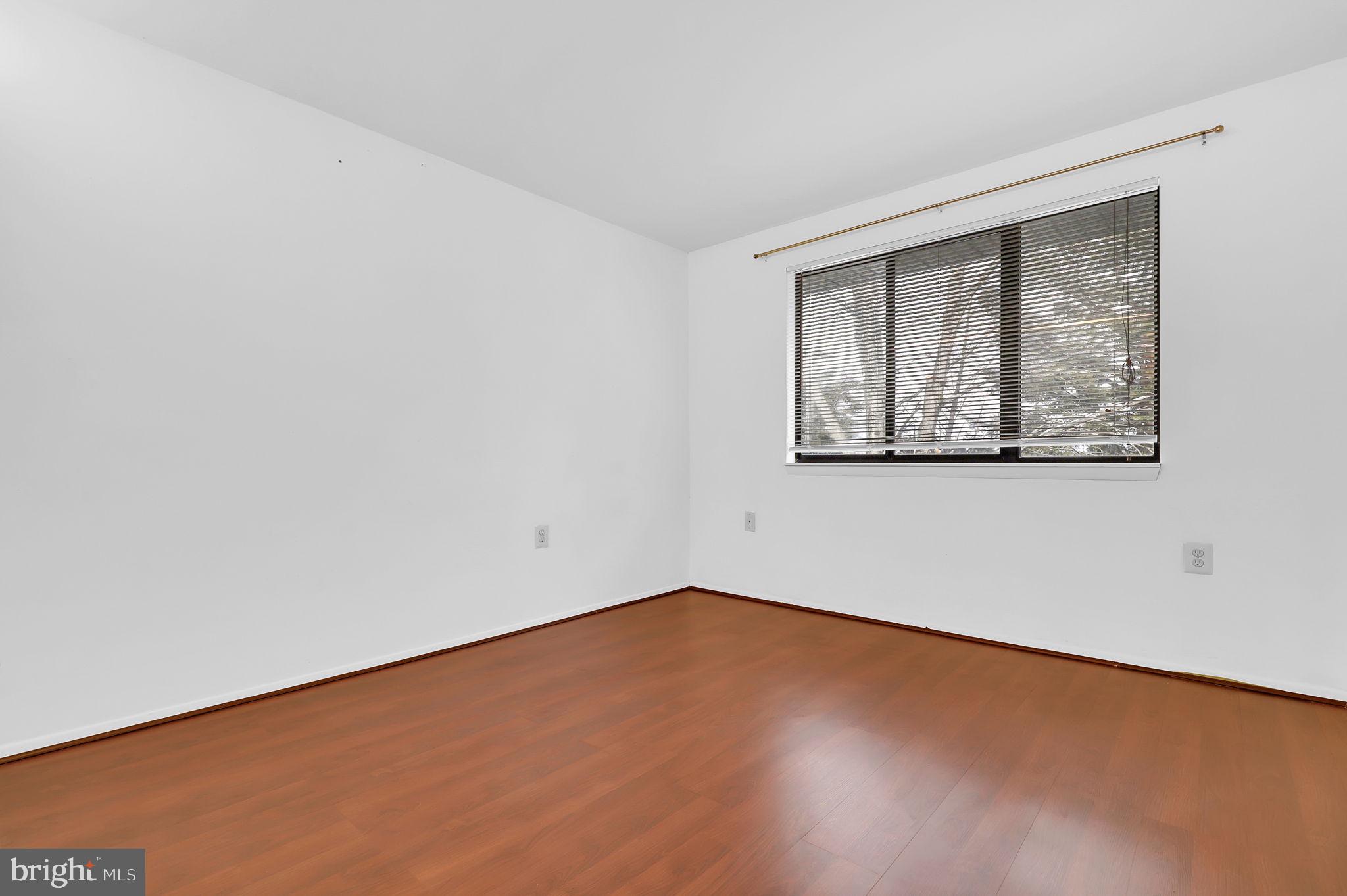 19625 Gunners Branch Road, Unit 932 Germantown, MD 20876 - Photo 13 of 21 an empty room with a window