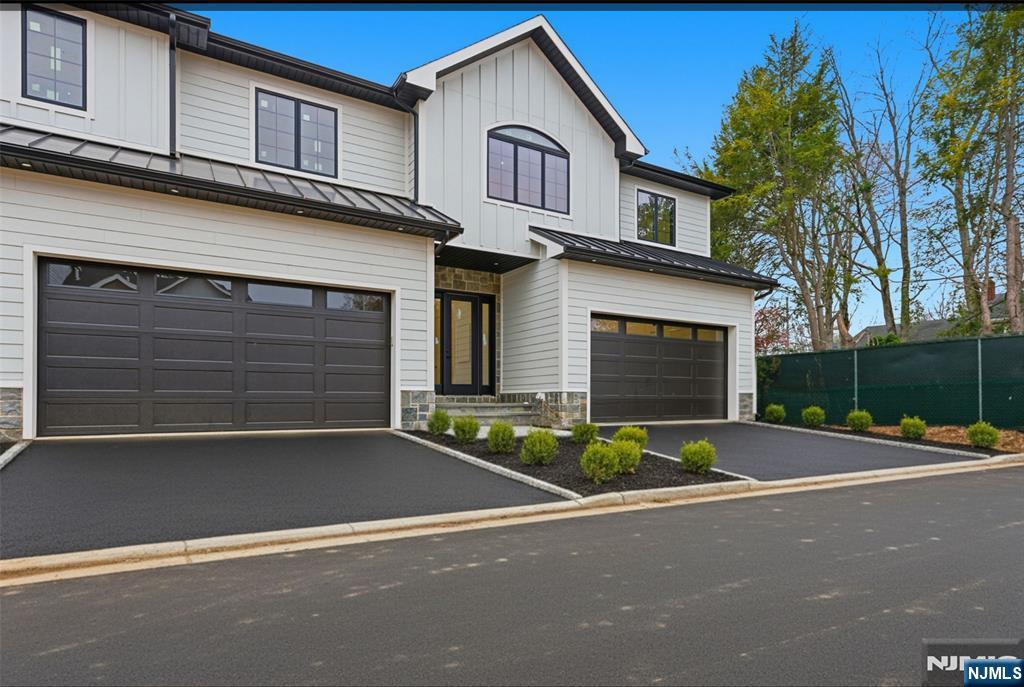 a front view of a house with yard