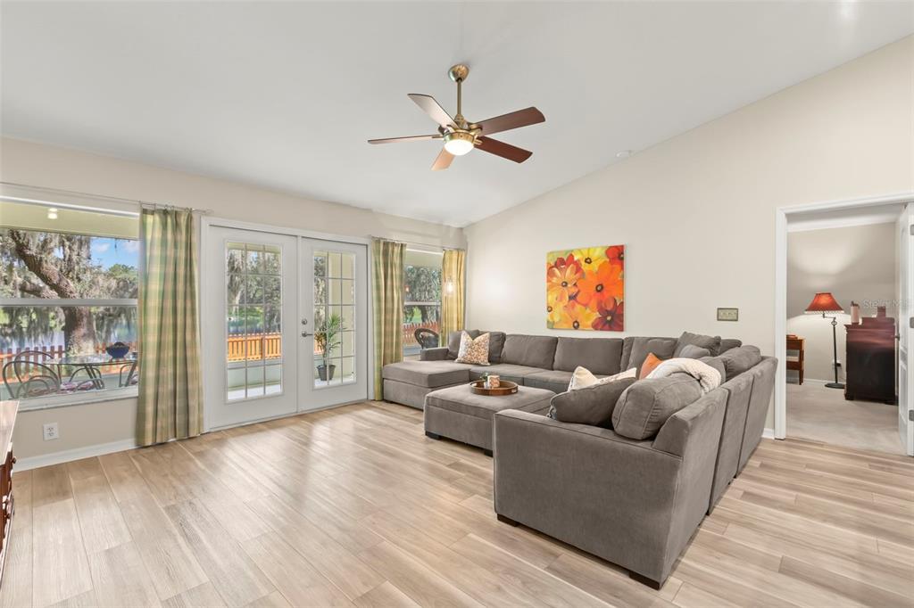 734 Berry Bramble Drive Brandon, FL 33510 - Photo 16 of 49 a living room with furniture and a large window