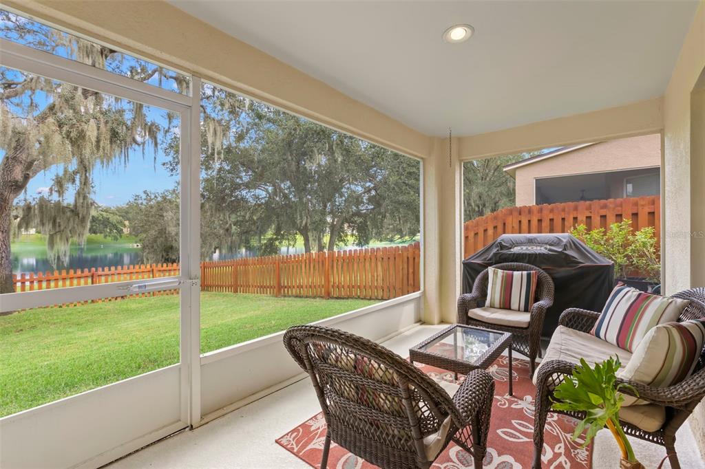 734 Berry Bramble Drive Brandon, FL 33510 - Photo 21 of 49 a outdoor living space with furniture and garden view