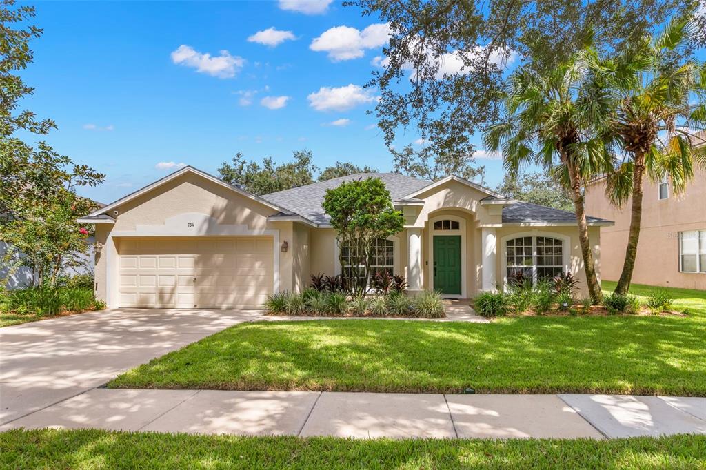 734 Berry Bramble Drive Brandon, FL 33510 - Photo 4 of 49 a front view of house with yard and green space