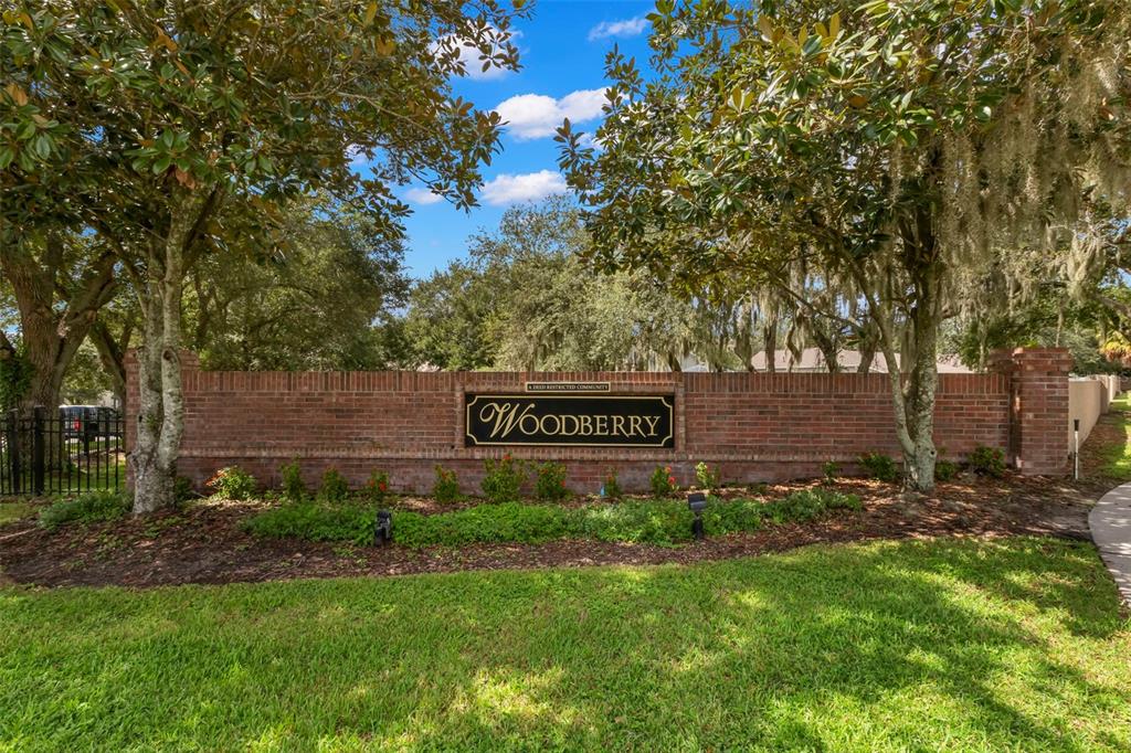 734 Berry Bramble Drive Brandon, FL 33510 - Photo 48 of 49 a sign that is sitting in the grass