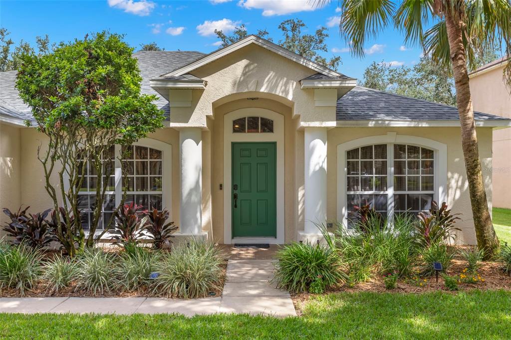 734 Berry Bramble Drive Brandon, FL 33510 - Photo 6 of 49 a front view of a house with garden