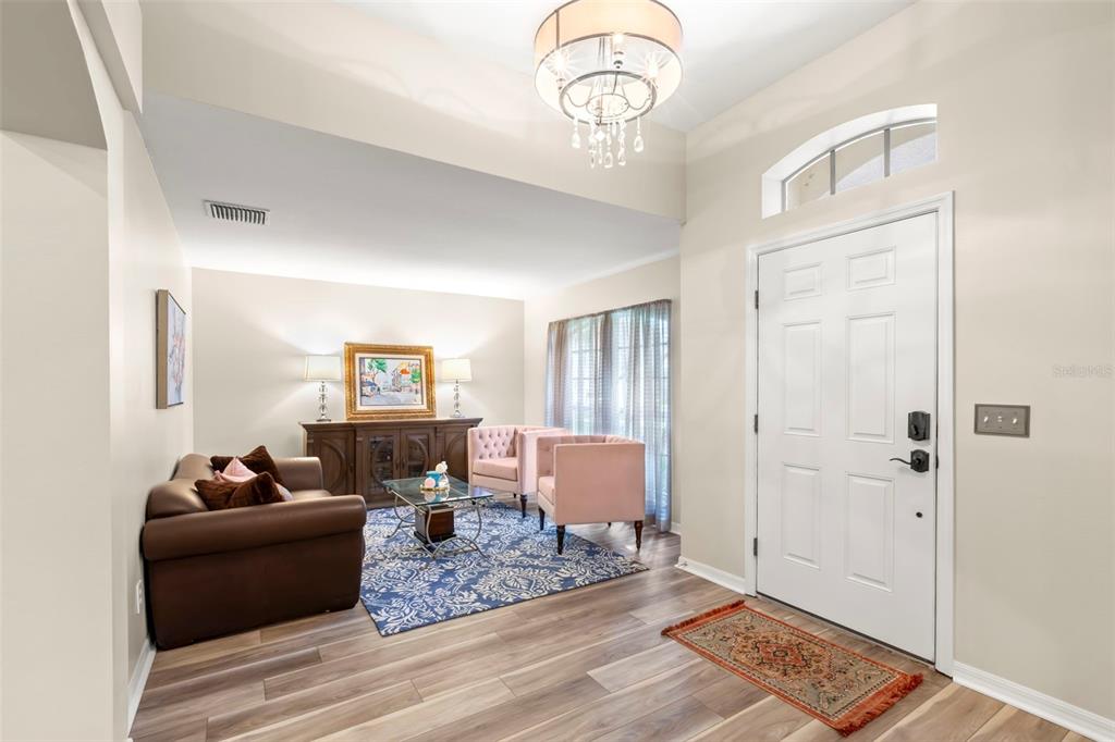 734 Berry Bramble Drive Brandon, FL 33510 - Photo 7 of 49 a living room with furniture and a window