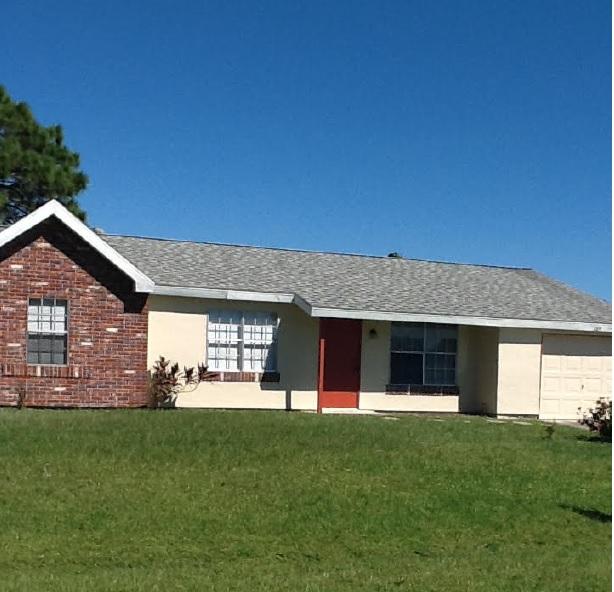 269 Southwest Cherryhill Road Port St. Lucie, FL 34953 - Photo 1 of 7 Front Exterior