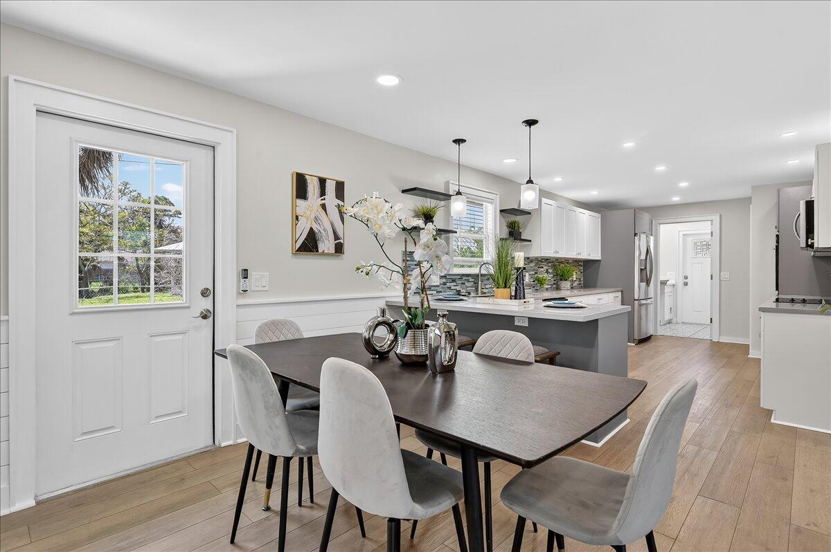 262 Easy Street Sebastian, FL 32958 - Photo 15 of 36 a view of a dining room with furniture and wooden floor