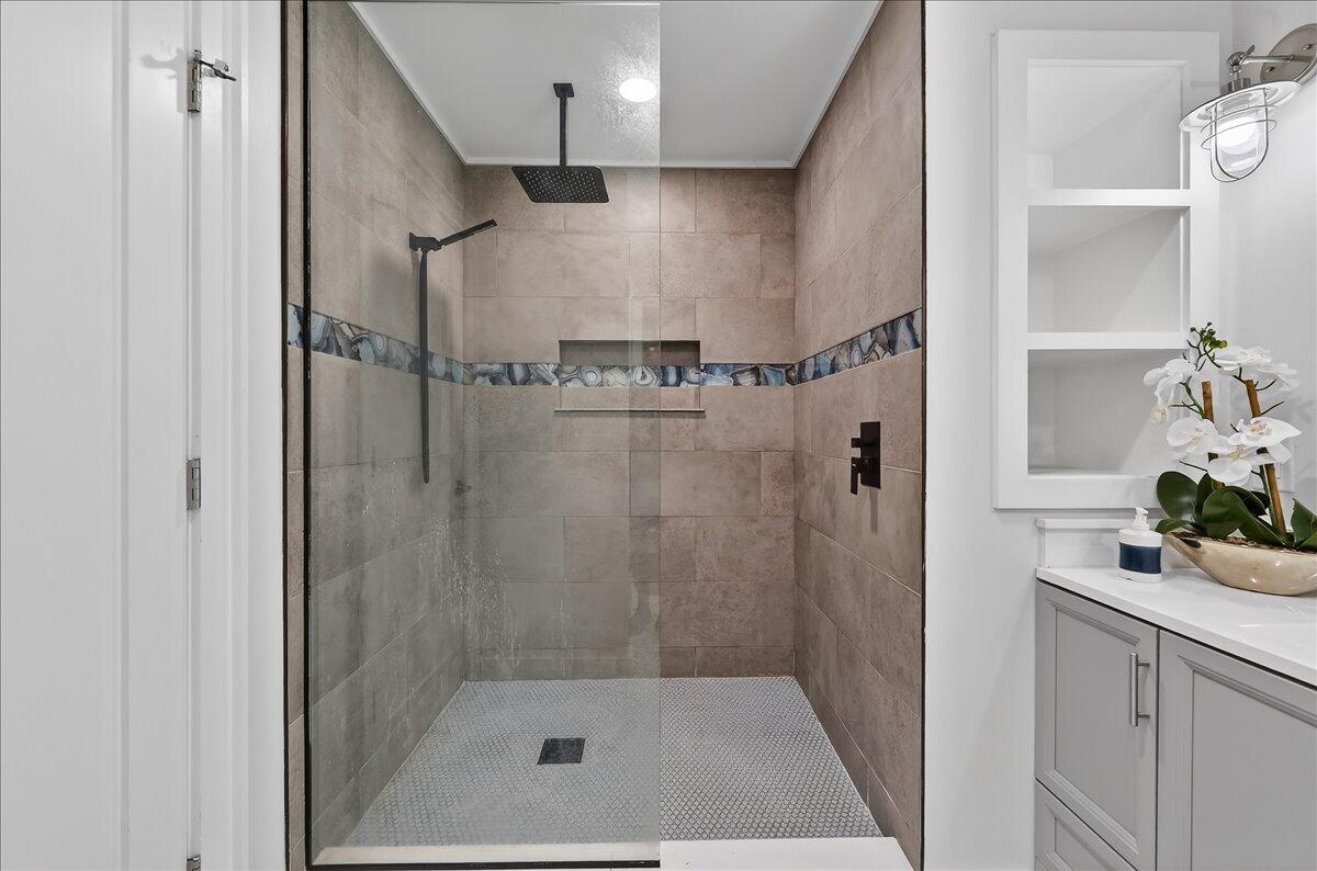 262 Easy Street Sebastian, FL 32958 - Photo 20 of 36 a bathroom with a shower and a sink