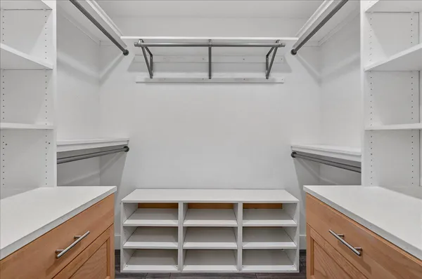 a view of an empty walk in closet