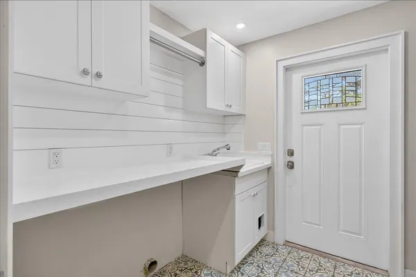 a room with cabinets and a wooden floors