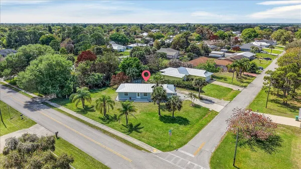 an aerial view of residential house with outdoor space