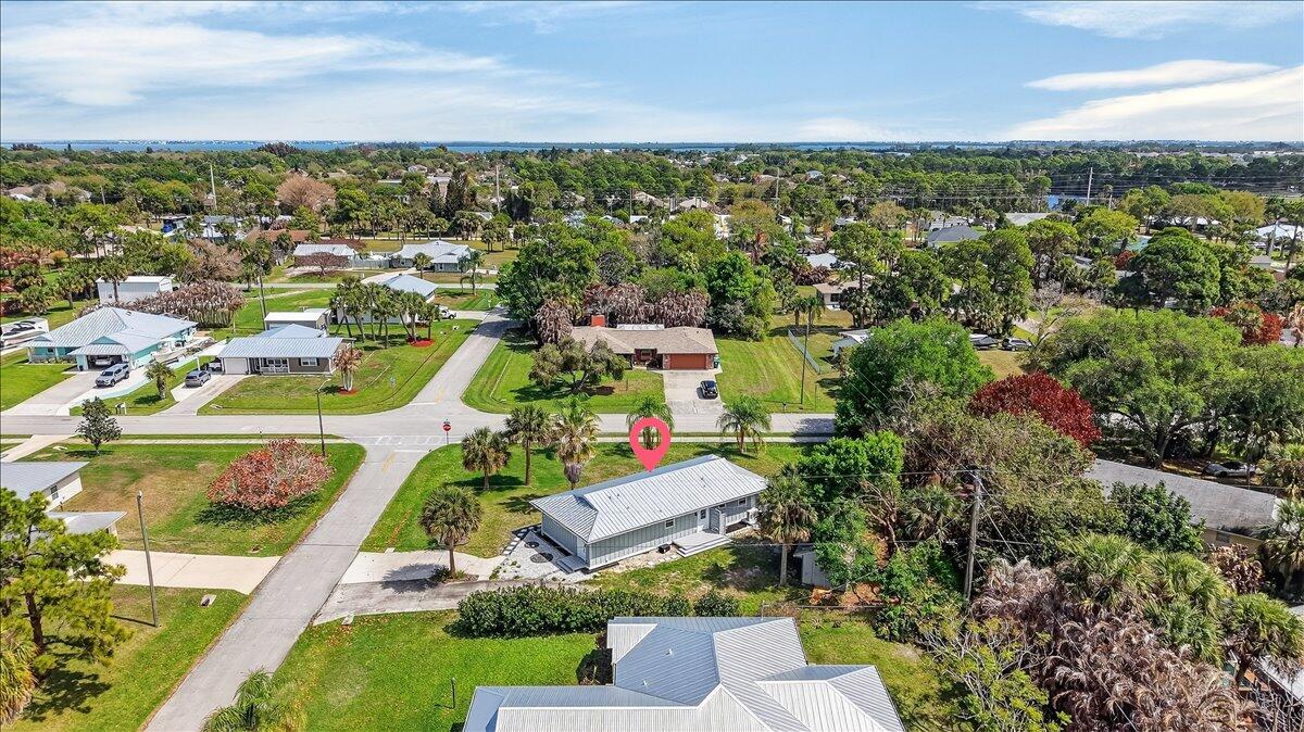 262 Easy Street Sebastian, FL 32958 - Photo 33 of 36 an aerial view of residential houses with outdoor space and trees