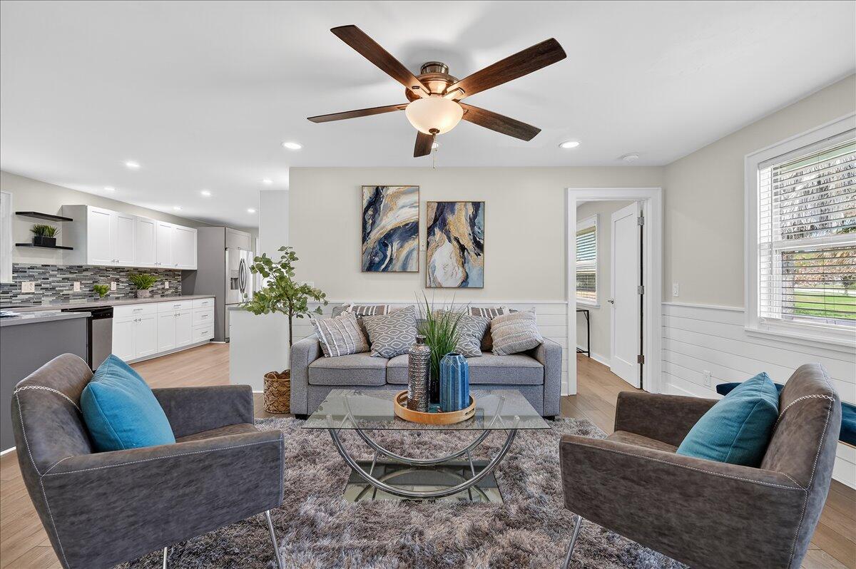 262 Easy Street Sebastian, FL 32958 - Photo 6 of 36 a living room with furniture and kitchen view