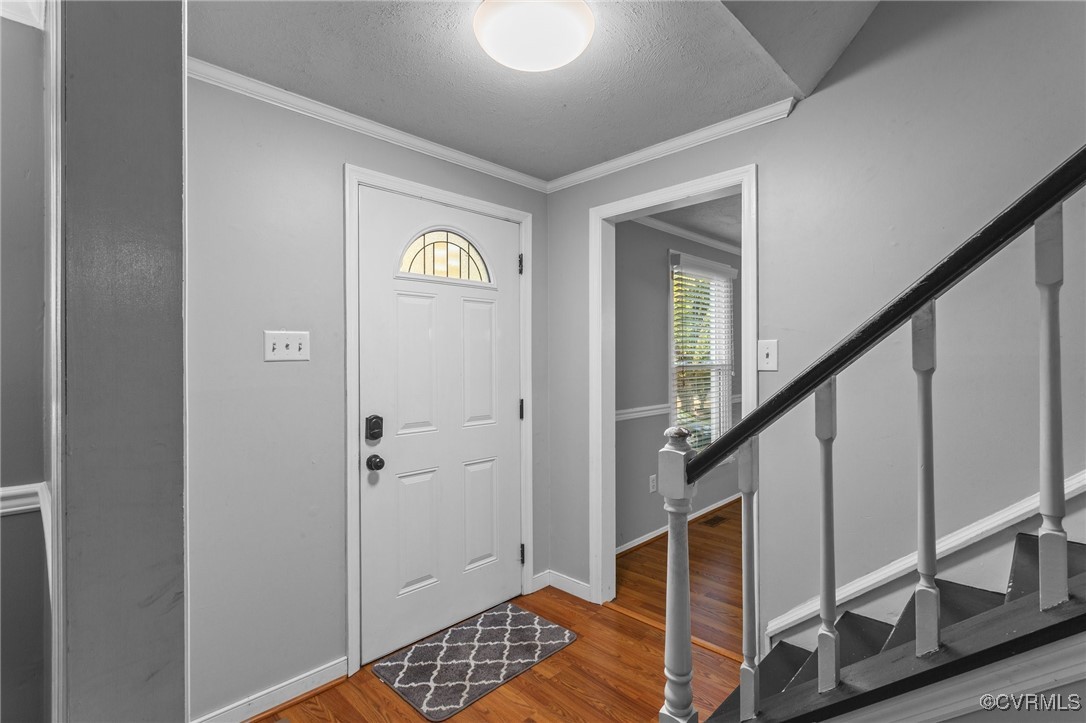 1200 Oldbury Road Midlothian, VA 23113 - Photo 11 of 42 a view of entryway with wooden floor and stairs