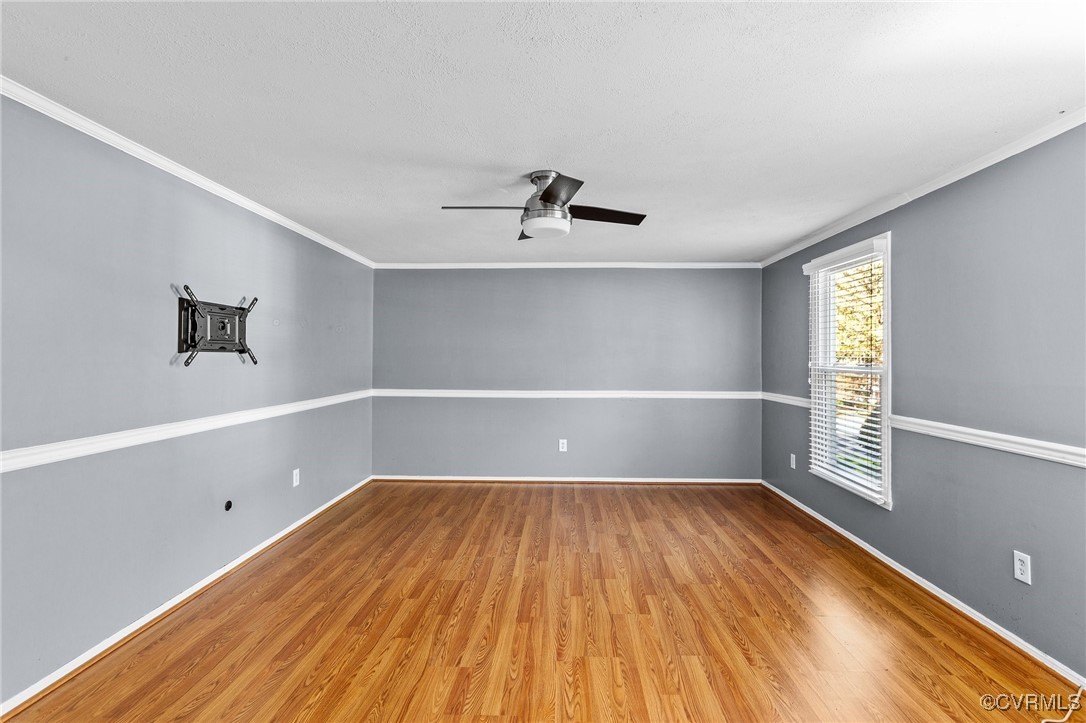 1200 Oldbury Road Midlothian, VA 23113 - Photo 13 of 42 a view of a room with wooden floor and a ceiling fan
