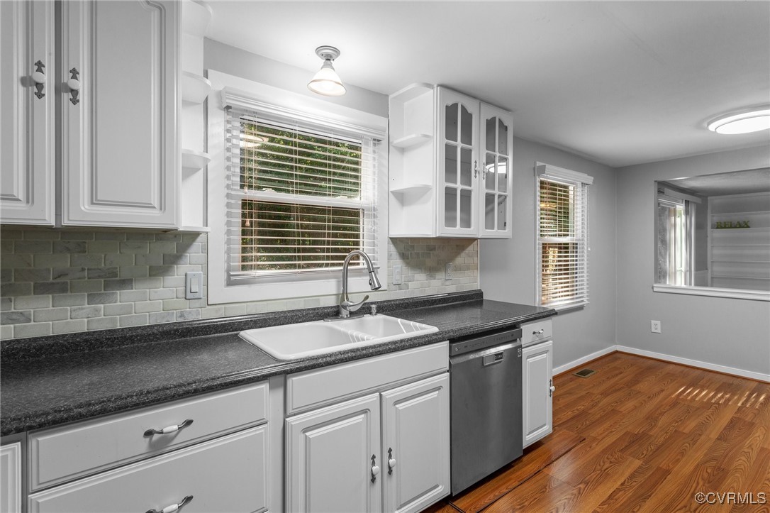 1200 Oldbury Road Midlothian, VA 23113 - Photo 15 of 42 a kitchen with granite countertop a sink cabinets and window