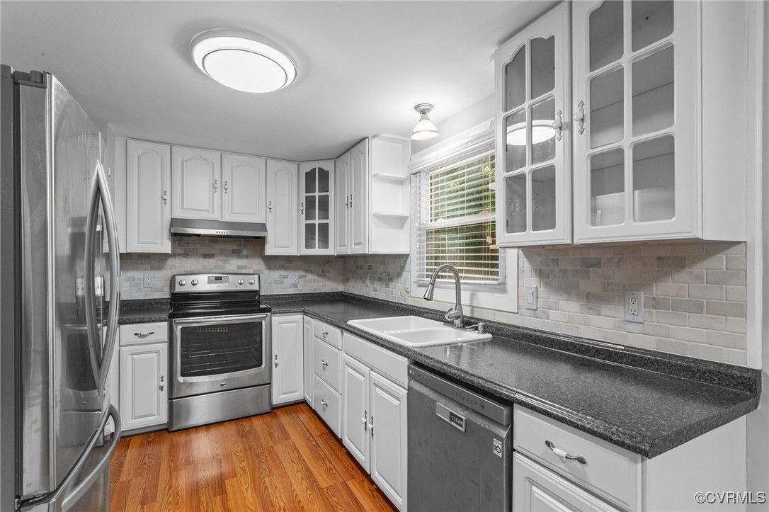 1200 Oldbury Road Midlothian, VA 23113 - Photo 17 of 42 a kitchen with granite countertop a sink stainless steel appliances and cabinets
