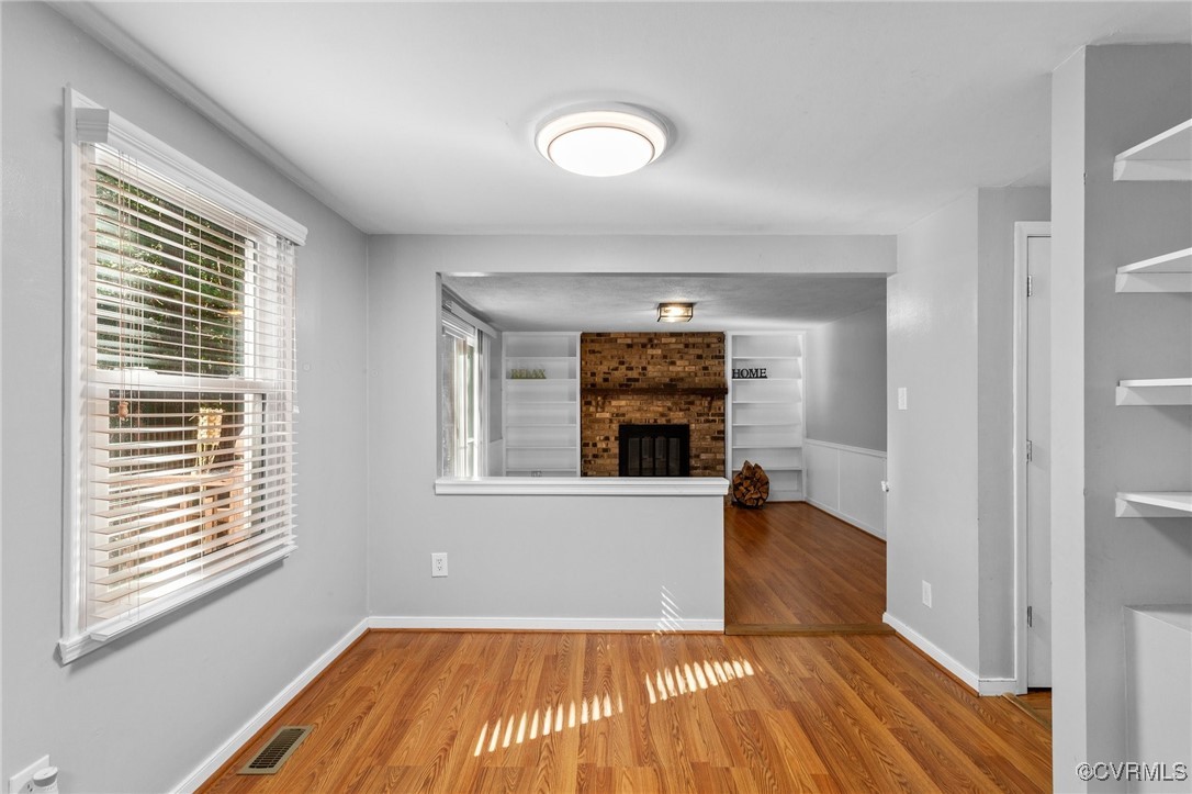 1200 Oldbury Road Midlothian, VA 23113 - Photo 18 of 42 a view of a room with wooden floor and a window