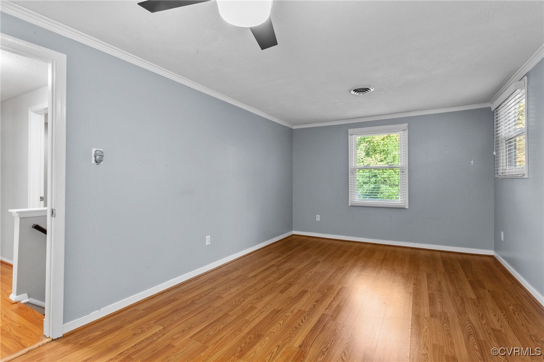1200 Oldbury Road Midlothian, VA 23113 - Photo 27 of 42 an empty room with wooden floor and windows