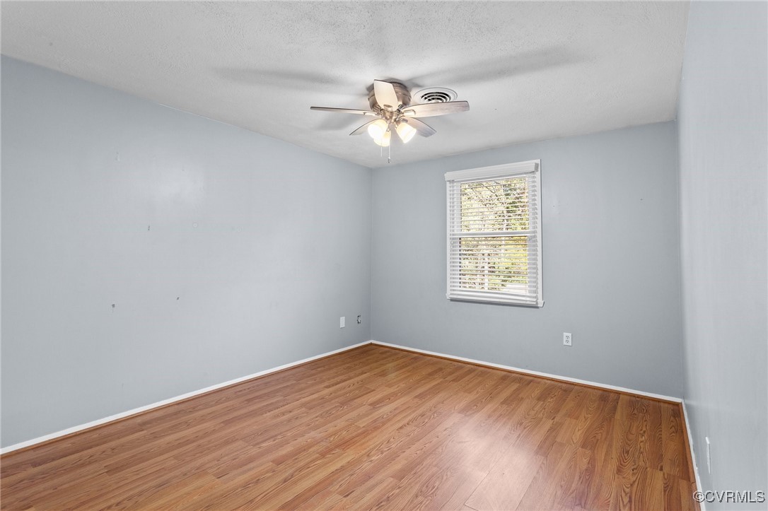 1200 Oldbury Road Midlothian, VA 23113 - Photo 5 of 42 wooden floor in an empty room with a window