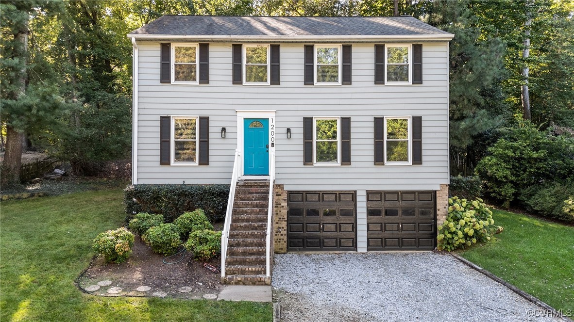1200 Oldbury Road Midlothian, VA 23113 - Photo 6 of 42 front view of a house with a yard