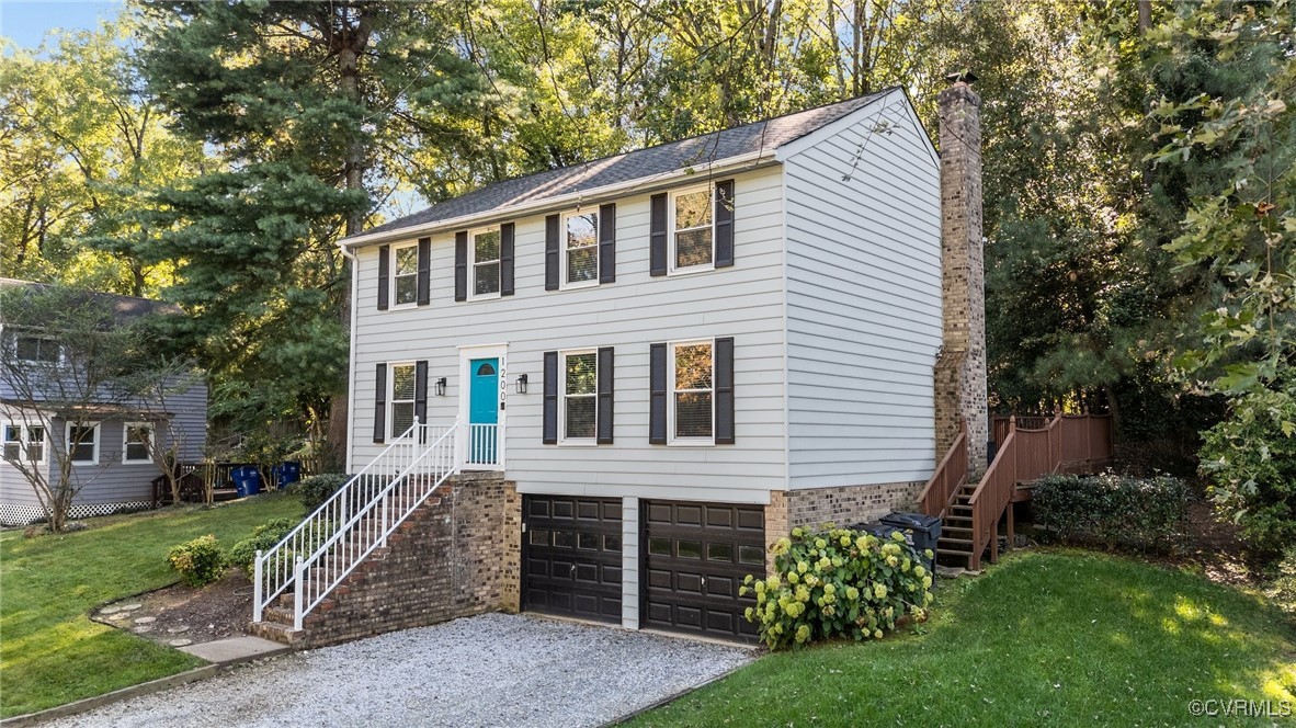 1200 Oldbury Road Midlothian, VA 23113 - Photo 7 of 42 a front view of a house with a garden