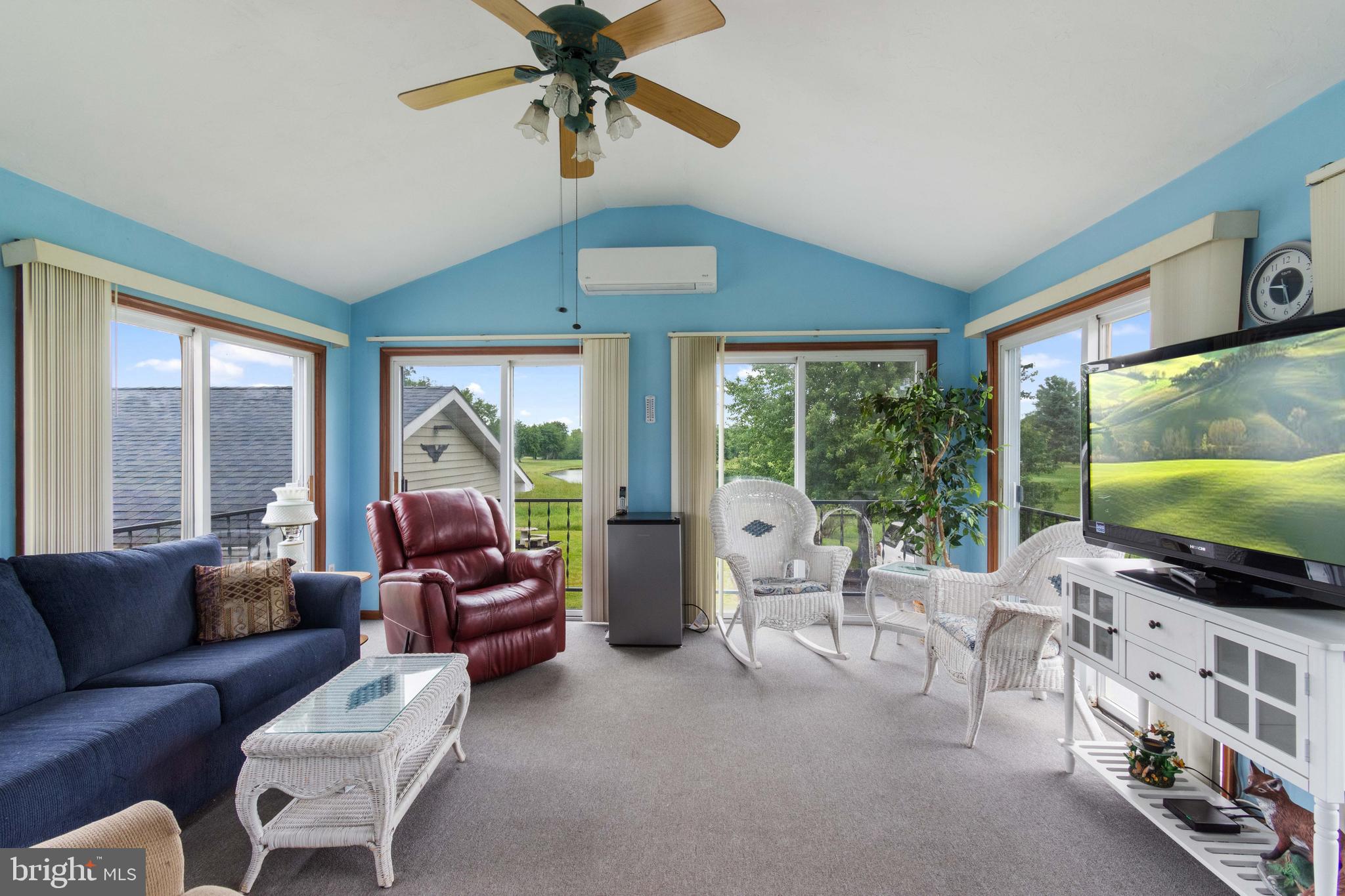 1424 Fish And Game Road Littlestown, PA 17340 - Photo 12 of 32 Out to the 4 season sunroom with 6 sliders