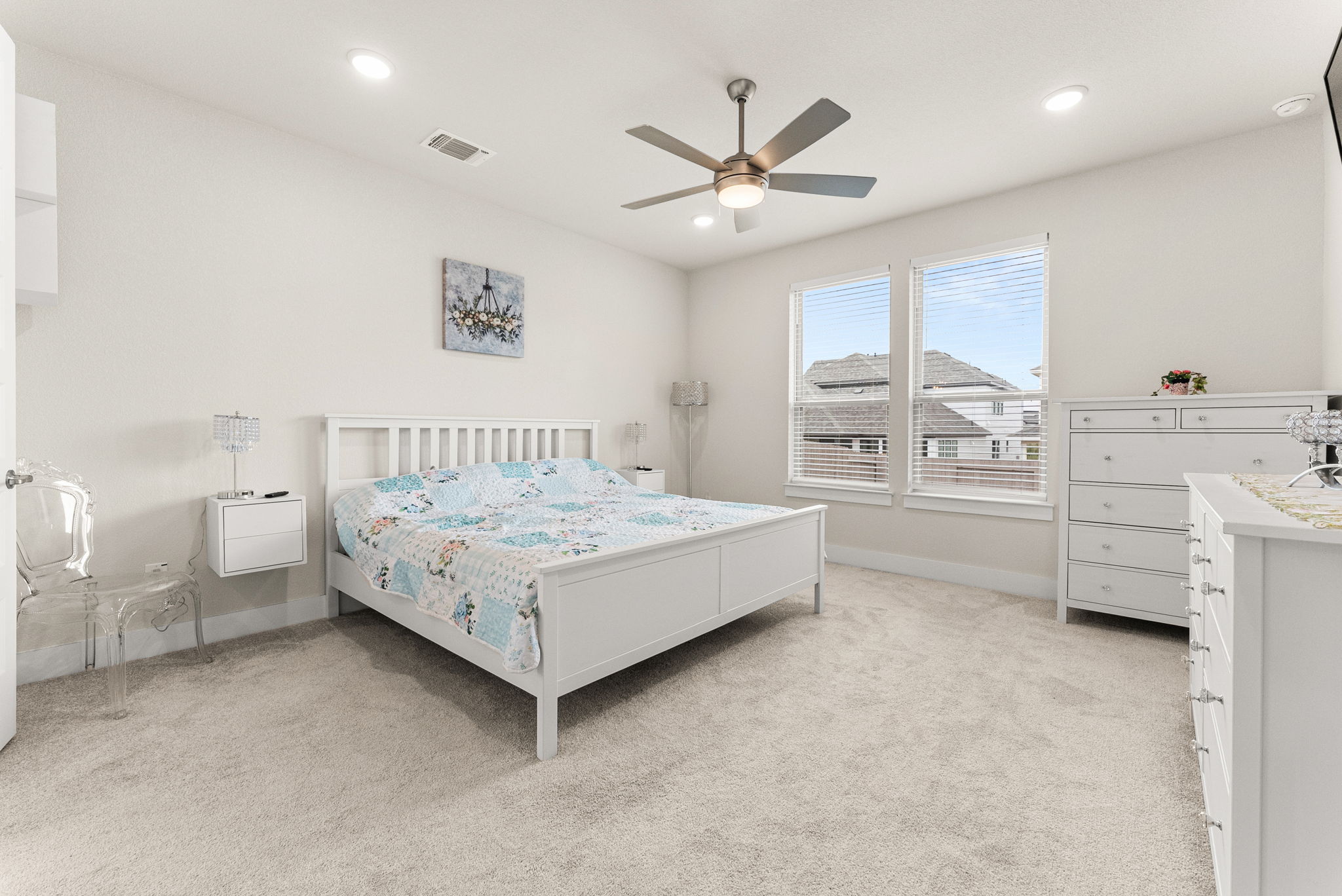 9508 Hamadryas Drive Austin, TX 78744 - Photo 16 of 40 The master bedroom has a ceiling fan, recessed lighting, two-inch blinds, and a big closet which has convenient, direct access to the laundry room.