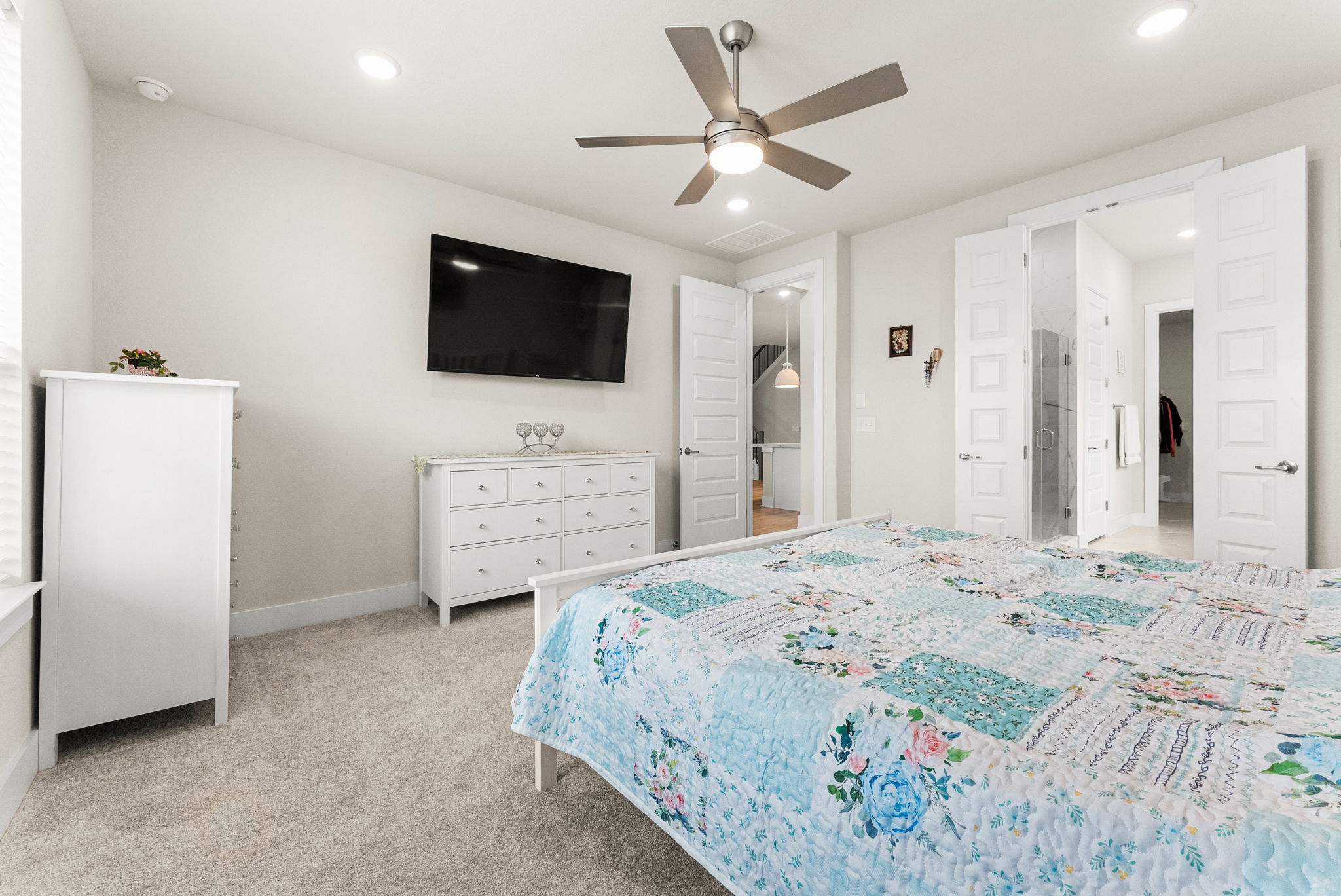 9508 Hamadryas Drive Austin, TX 78744 - Photo 17 of 40 The master bedroom has a ceiling fan, recessed lighting, two-inch blinds, and a big closet which has convenient, direct access to the laundry room.