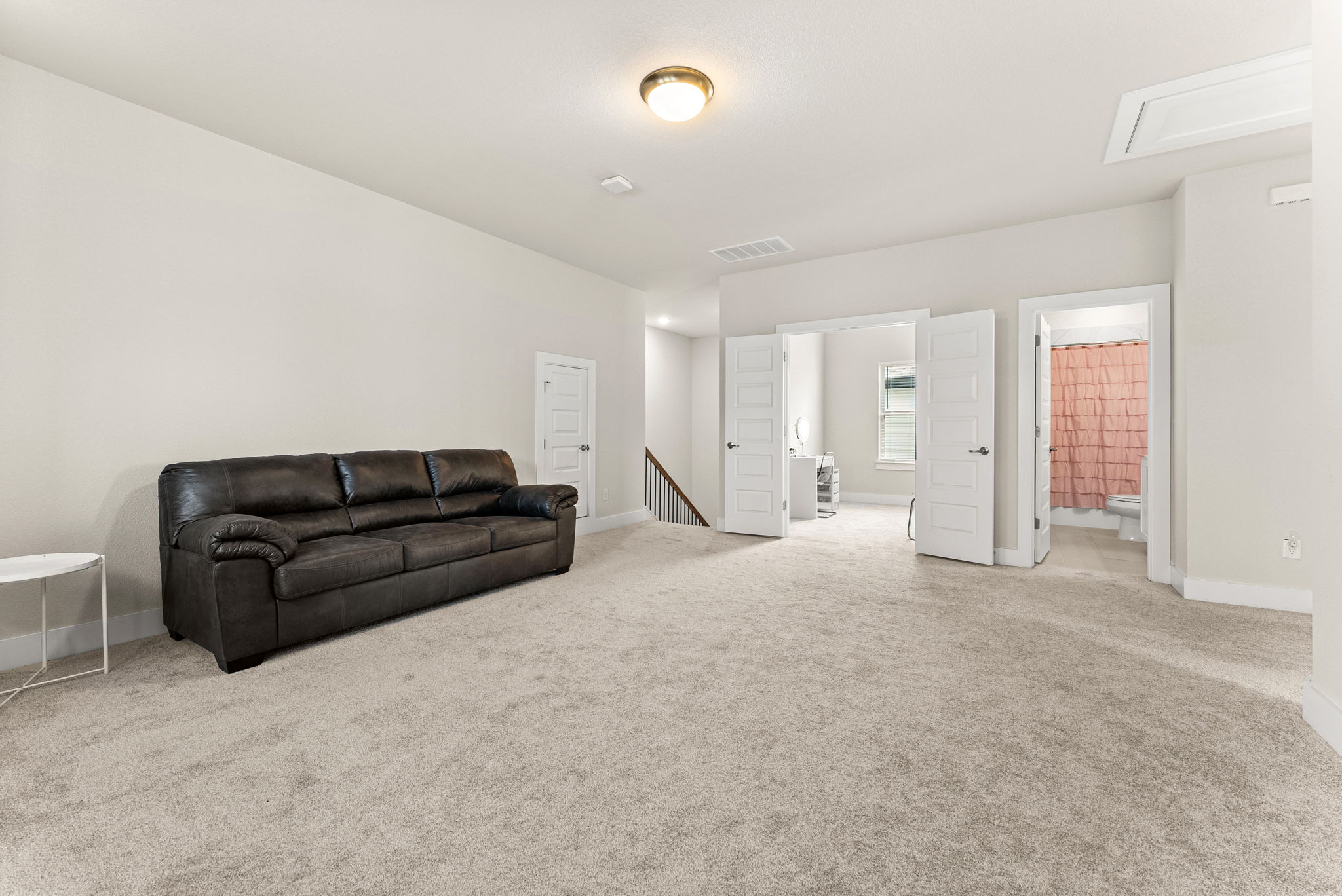 9508 Hamadryas Drive Austin, TX 78744 - Photo 26 of 40 The large game room is the focal point of the second floor.