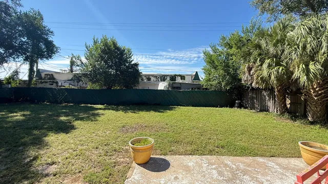 a house with trees in front of it