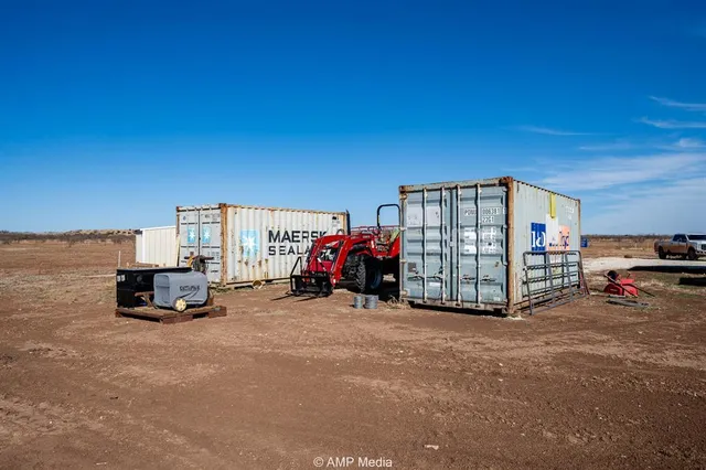 a view of a car in front of a building