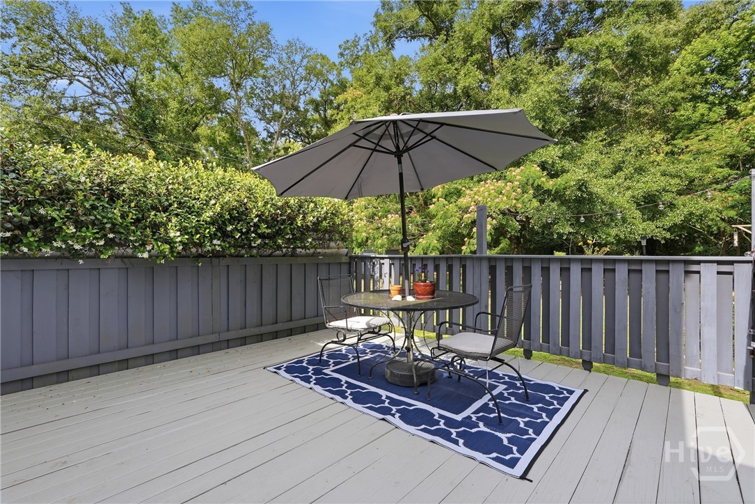 3 Rice Mill Drive Savannah, GA 31419 - Photo 24 of 37 The outdoor deck has space to entertain guests and features two separate areas for dining and sun bathing.