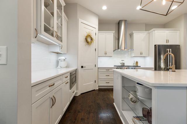 a bedroom with a bed and lamp