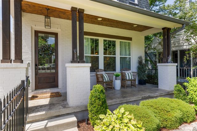 a view of kitchen and dining room with wooden floor