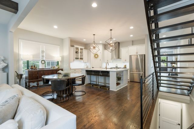 a bedroom with a bed and a table