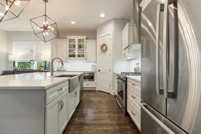 a bedroom with a flat screen tv and a bed