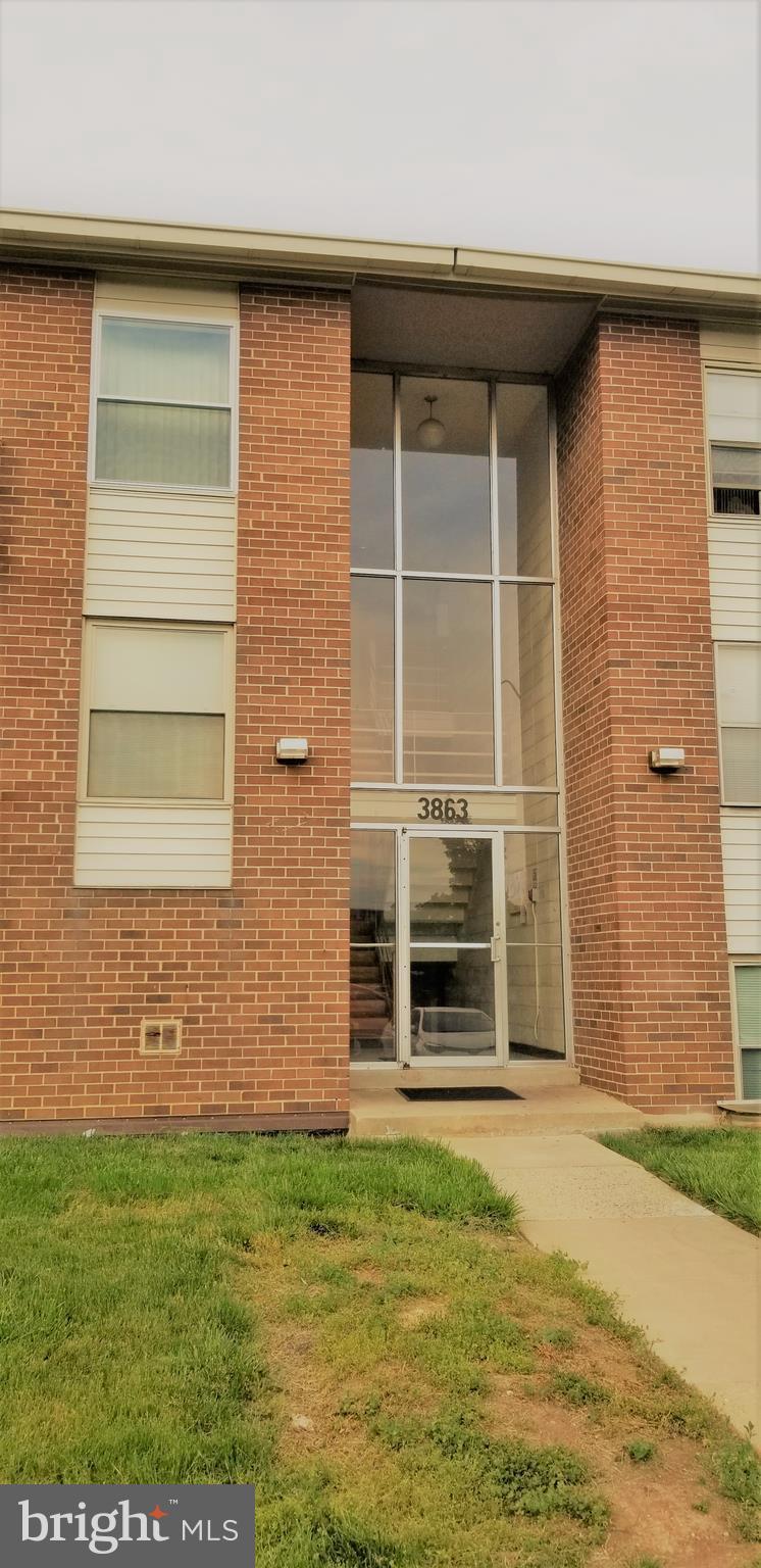 3863 St Barnabas Road, Unit T Suitland, MD 20746 - Photo 1 of 6 a front view of a house