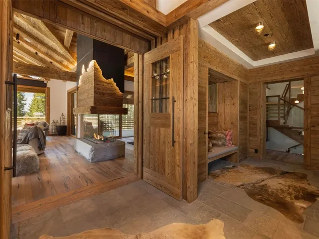 a view of a hallway with a living room