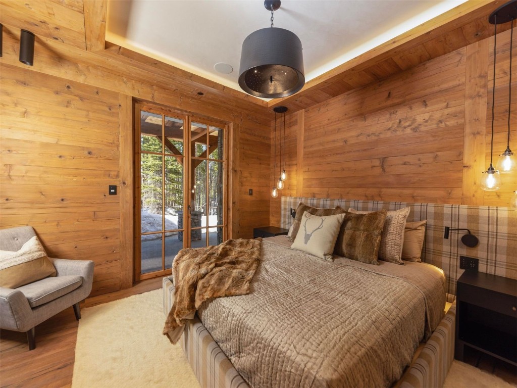 256 Timbertrail Road Breckenridge, CO 80424 - Photo 23 of 31 a bedroom with a bed and a couch