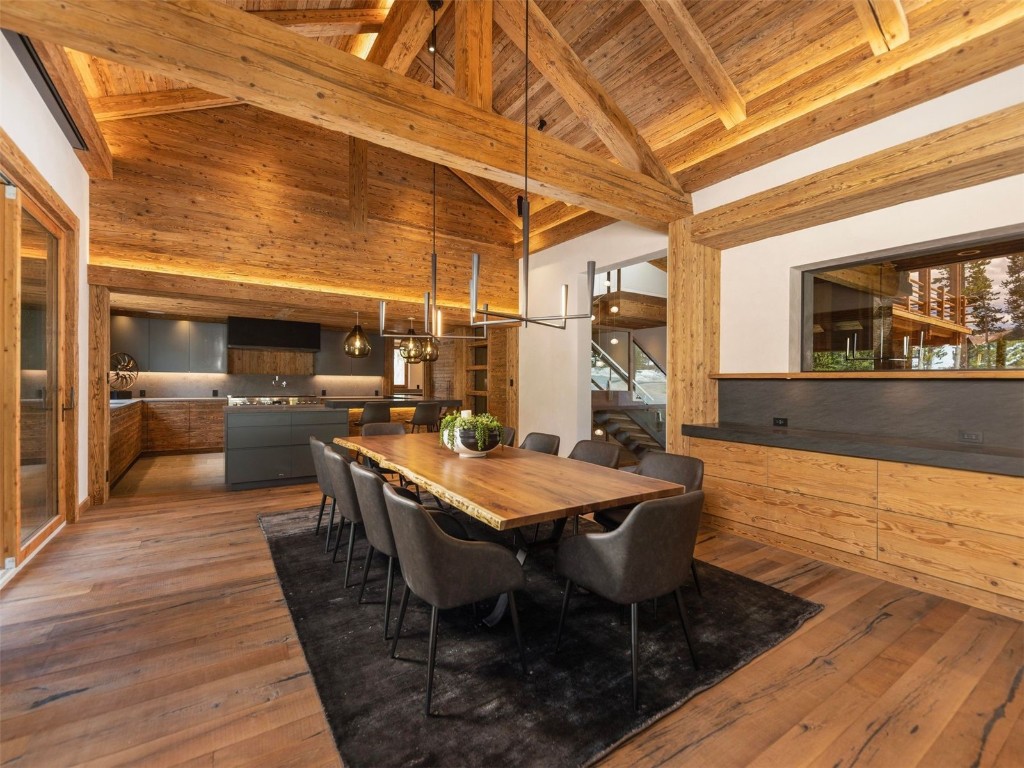 256 Timbertrail Road Breckenridge, CO 80424 - Photo 28 of 31 a dining room with a wooden table and chairs