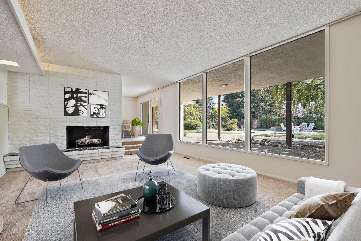 80 Gresham Lane Atherton, CA 94027 - Photo 17 of 30 a living room with furniture and a fireplace