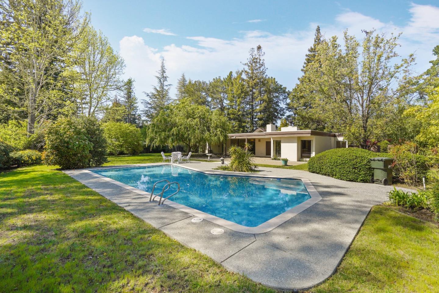 80 Gresham Lane Atherton, CA 94027 - Photo 27 of 30 a view of a swimming pool with a yard