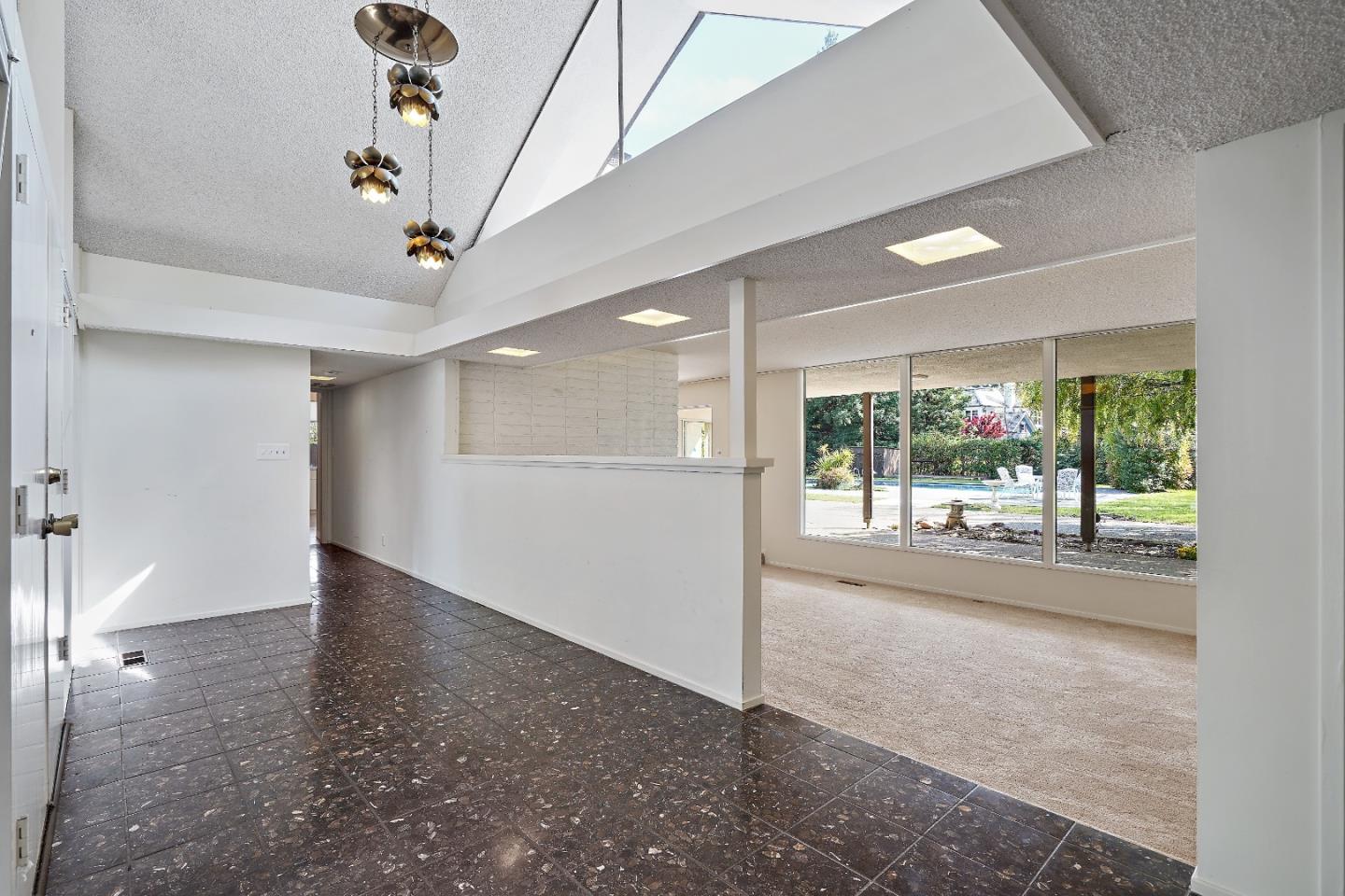 80 Gresham Lane Atherton, CA 94027 - Photo 9 of 30 a view of a livingroom with a ceiling fan and window