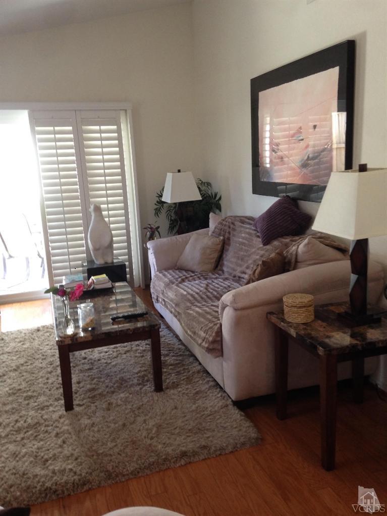 725 Congressional Road Simi Valley, CA 93065 - Photo 8 of 18 a living room with furniture and a window